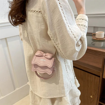 Mini crossbody women's bag in seven colour options with single shoulder strap