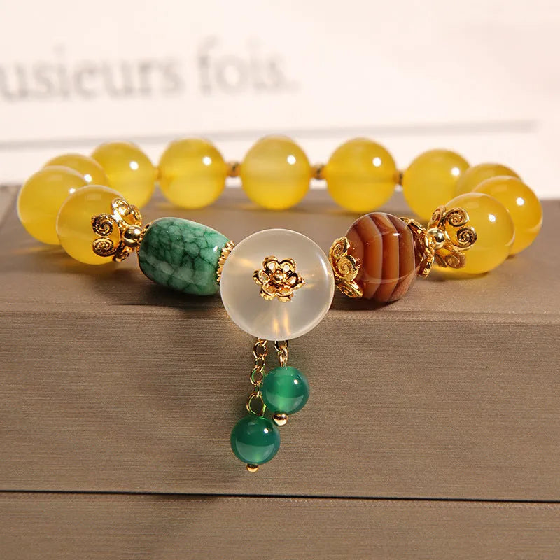Yellow agate crystal bracelet for women with gold silk threading in khaki colour