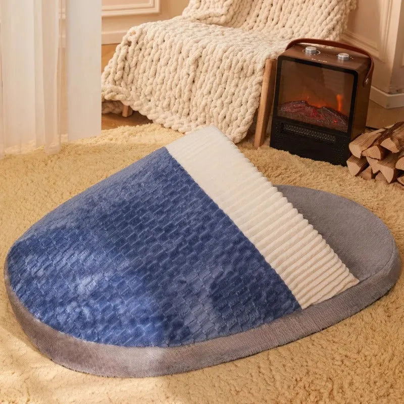 Blue foldable dog nest sleeping bag with removable fleece lining, shown unfolded on a floor.