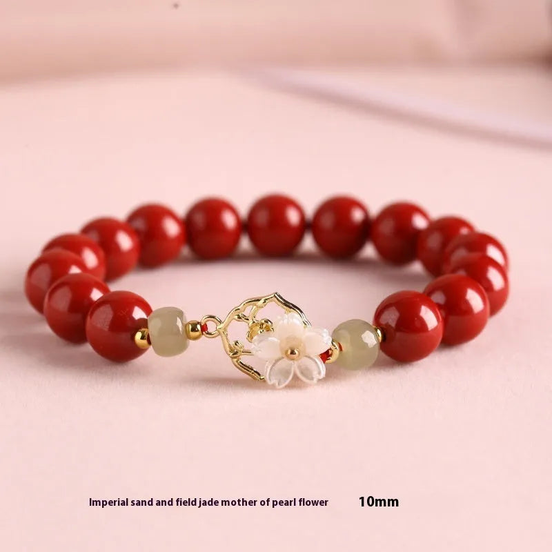 Handcrafted cinnabar bracelet with Hetian jade elements and lotus motifs in New Chinese style showing purple gold sand and emperor sandstone colour options