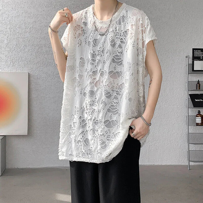 Black loose-fit sleeveless vest with ripped detail and wide shoulders, showcasing Japanese retro style.