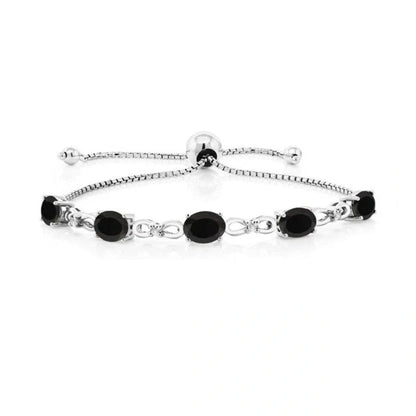 Elegant black bracelet with zircon stones, a timeless British accessory