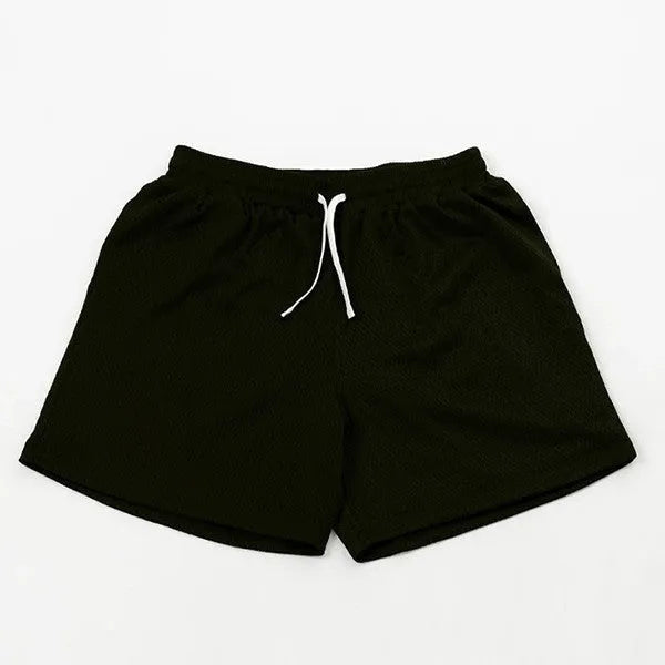 Men's black mesh athletic shorts with built-in liner on a grey background.