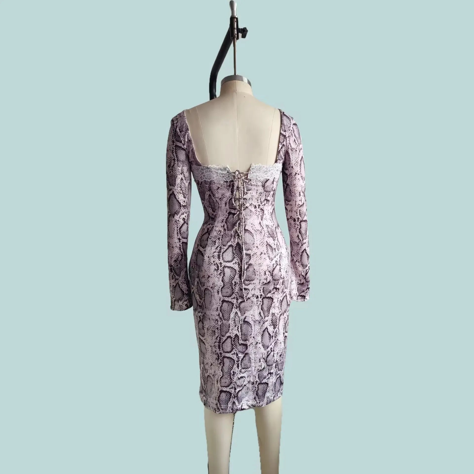 Grey lace dress with 3D floral digital print, A-line skirt, and long slim-fit sleeves on a mannequin.