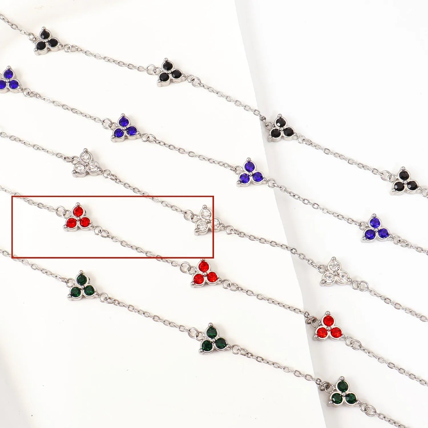 Women's stainless steel three diamond geometric triangular bracelet in gold finish with white zircon gemstones