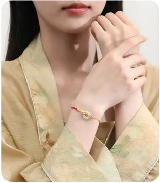 Women's retro 925 silver bracelet with gold electroplated koi fish and peace buckle design