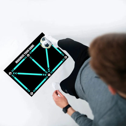 Black rectangular football training mat measuring 60cm by 90cm on a flat surface.