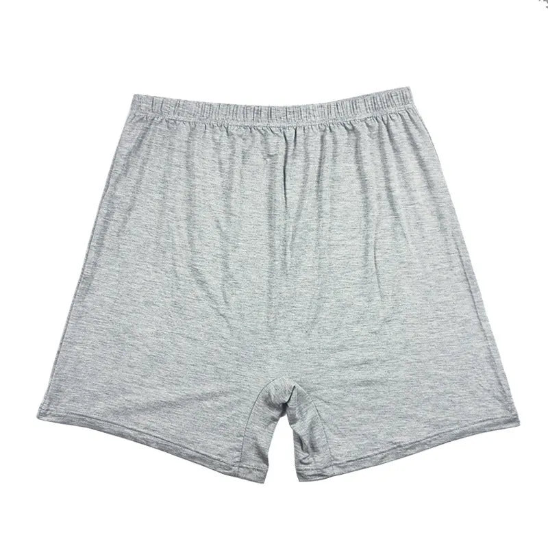 Men's solid colour high-waist boxers in modal fabric laid flat.
