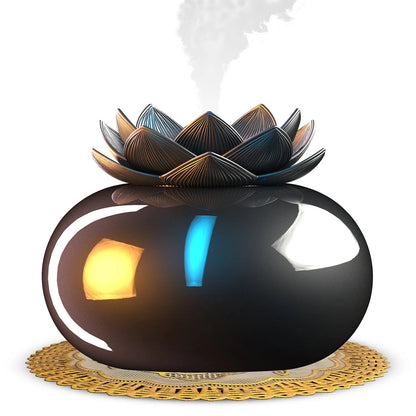 Round black Lotus aromatherapy humidifier with USB cable connection and single mist outlet