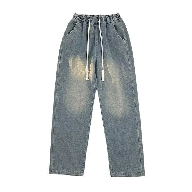 Men's blue straight-leg denim trousers with drawstring waist shown on hanger