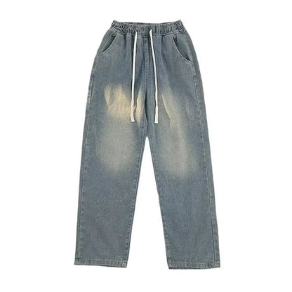Men's blue straight-leg denim trousers with drawstring waist shown on hanger