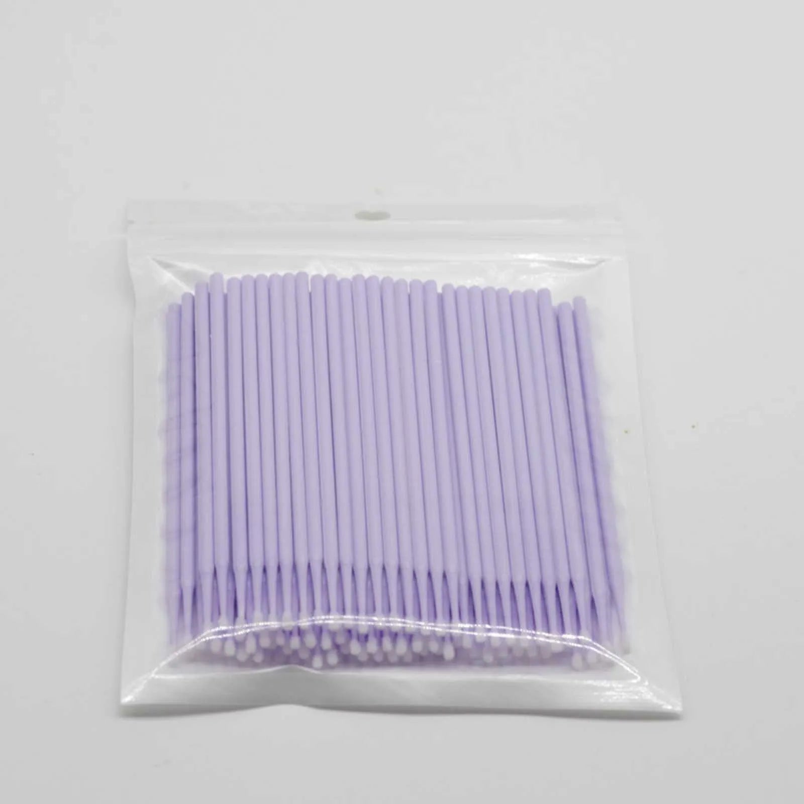 Disposable micro applicator brushes with coloured plastic handles and bendable cotton swab tips