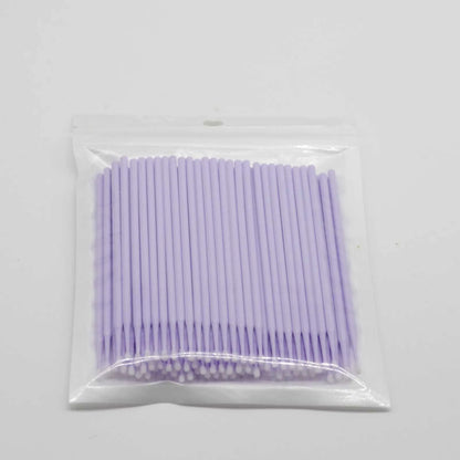 Disposable micro applicator brushes with coloured plastic handles and bendable cotton swab tips