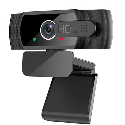 Black USB webcam with microphone on a laptop screen, showing 360-degree rotation and universal clip.