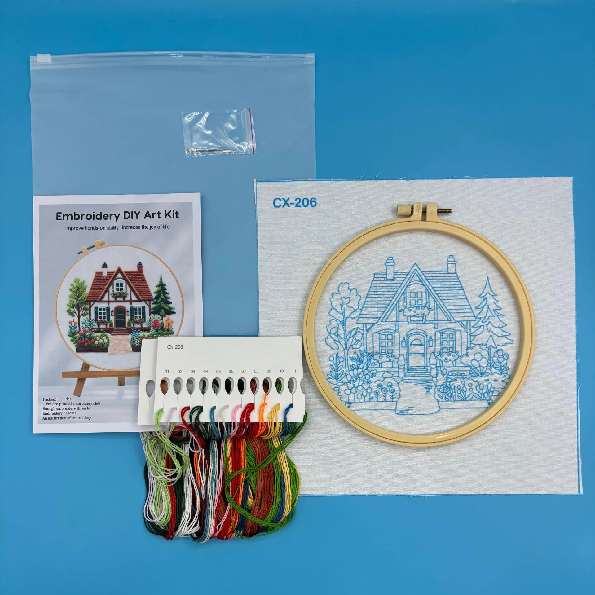 Garden Cottage embroidery fabric package with 28x28cm cotton linen cloth showing landscape pattern
