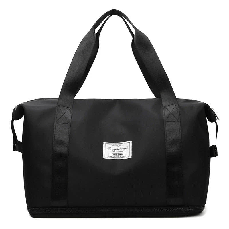 Spacious gym travel bag in various colors, featuring multiple pockets and comfortable carrying handles for workout, yoga, and outdoor use.