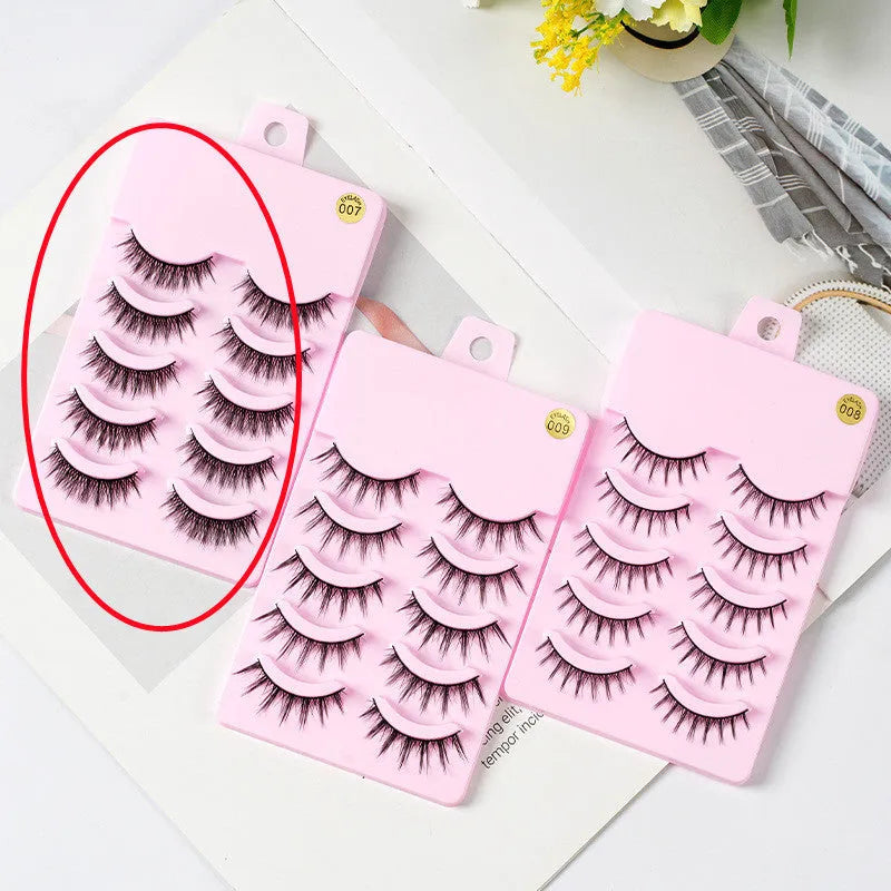 Three styles of black anime false eyelashes on a white background from a 15-pair pack.