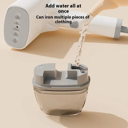 Blue handheld garment steamer with water tank, measuring 196mm long, on white background