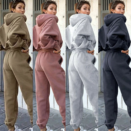 Women's polyester hoodie jacket and sports pants set in various colors for casual and athletic wear