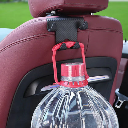 Black ABS plastic car hook and mobile phone holder bracket for rear seat mounting.