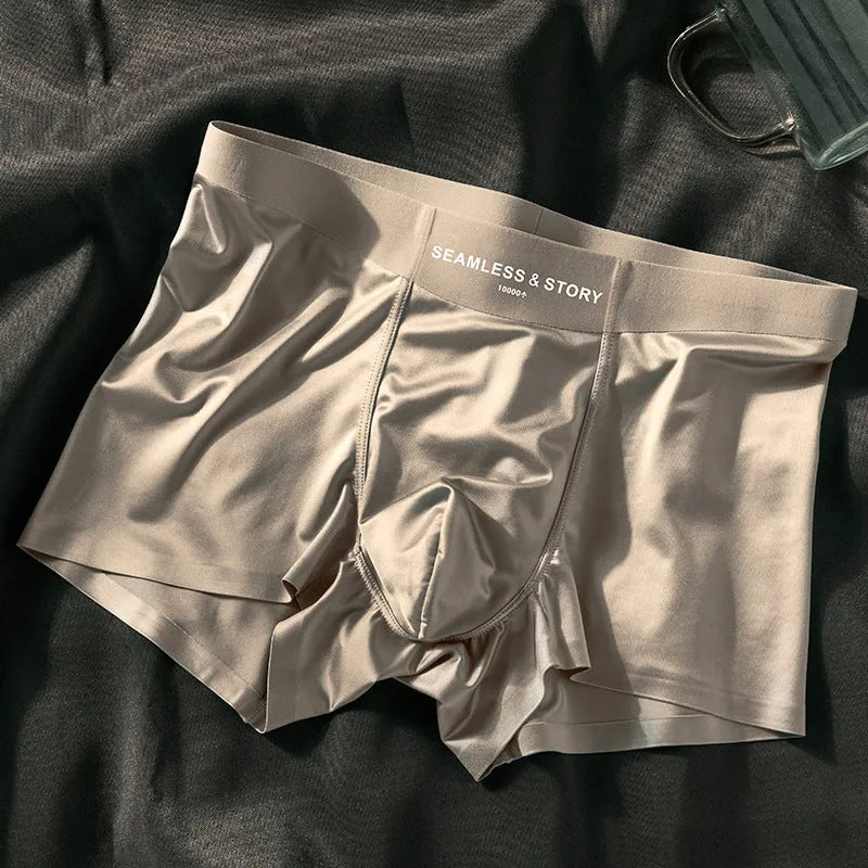 Men's solid colour satin ice silk boxer shorts laid flat, showing mid-waist design.