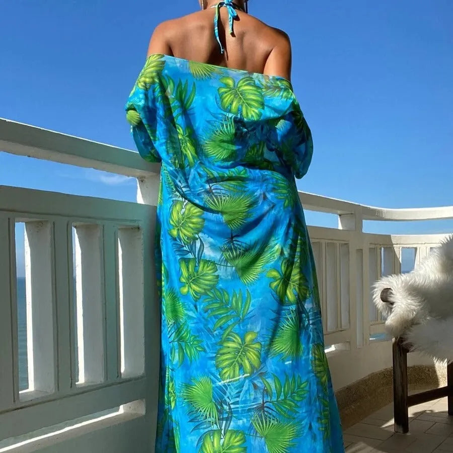 Polyester banded bikini set with long sleeve blouse, briefs, and robe cover-up in floral pattern