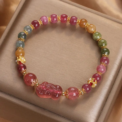 Women's pink and red crystal bracelet with strawberry quartz and tourmaline beads