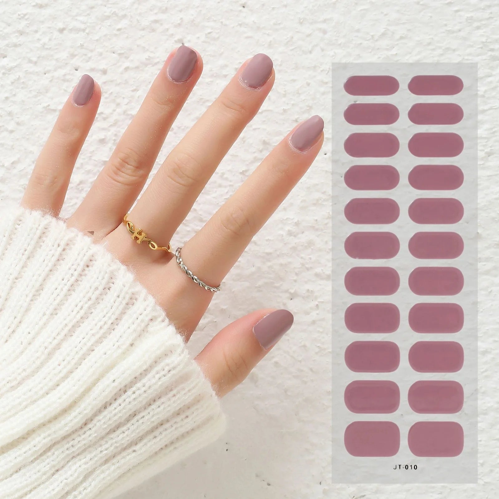 Semi-curing gel nail stickers sheet showing 22 solid colour designs including roses, tulips, and geometric patterns
