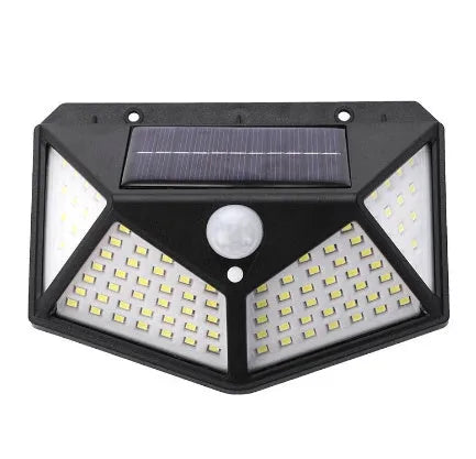 Solar-powered outdoor garden lamp with motion sensor mounted on wooden post
