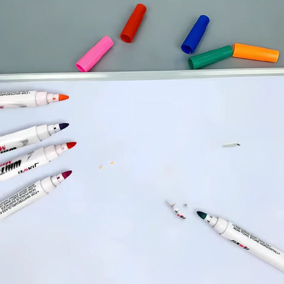Children's floating water painting pens with oil-based colours and plastic spoon for creating temporary artwork