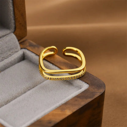 Adjustable geometric open ring in gold electroplated copper with five style options