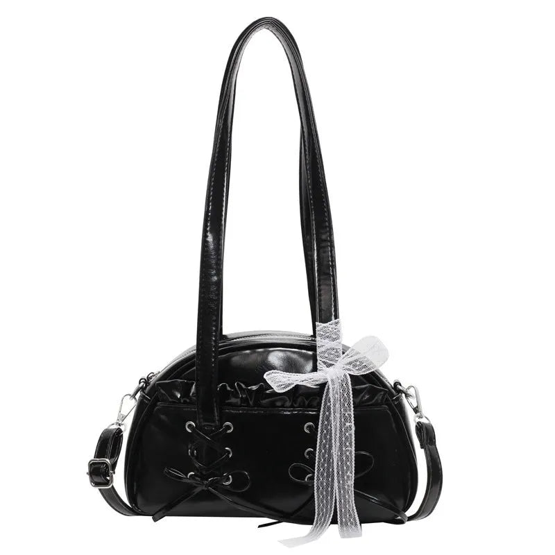 Women's PU leather casual shoulder handbag with a large bandage bow and sewing thread detail.