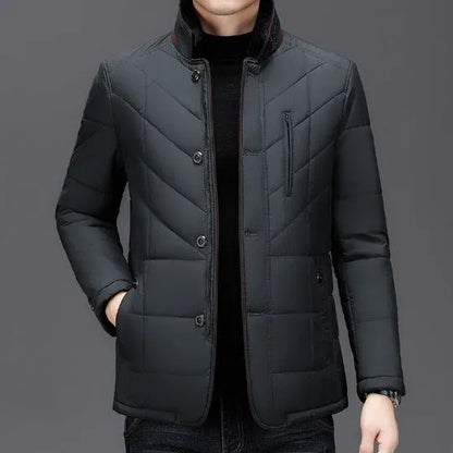 Men's solid colour winter padded coat in dark blue, shown with side seam pockets.