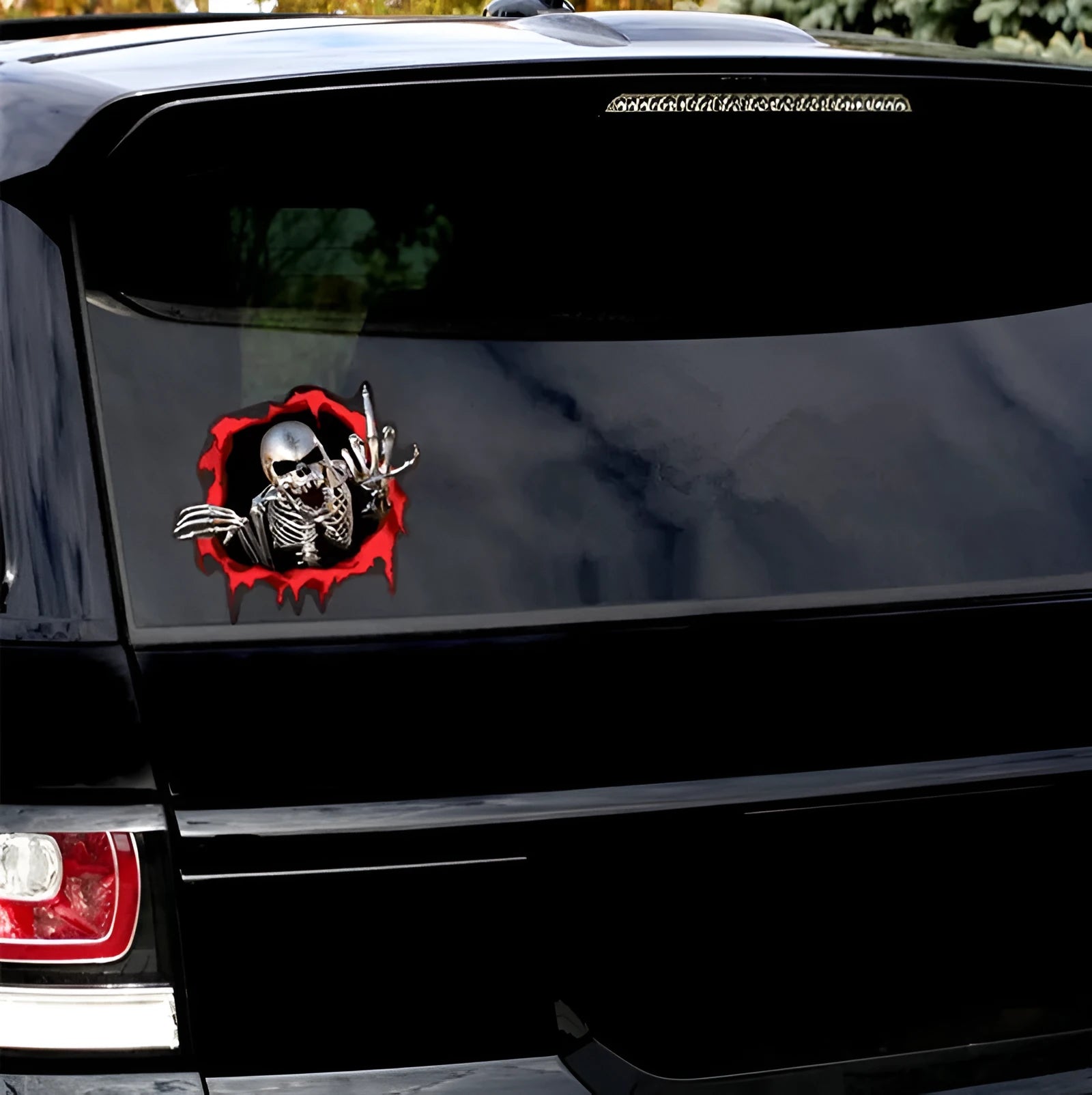 Reflective metal skull car sticker with colourful broken shell design measuring 15 by 14 cm