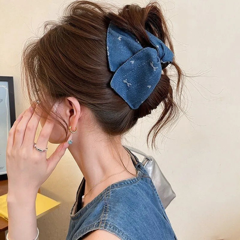 Women's handmade hair clip with denim fabric bow triangle decoration and plastic grip