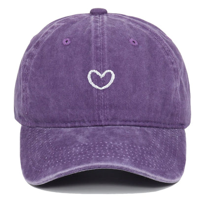 Retro-style baseball cap with colourful machine embroidery on a soft cotton dome crown, shown in a wine red colour.