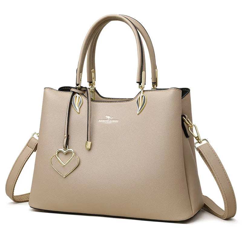 Black women's multi-layer PU leather shoulder messenger bag with sewing thread detail.