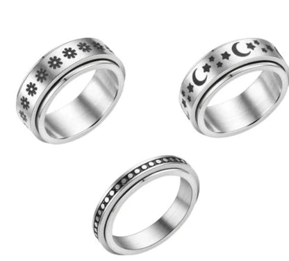 Titanium steel ring with intricate star and moon designs, available in various sizes and colors