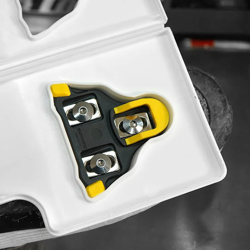 Locking plate adjustment tool for SPD and KEO bicycle cleats on a white background.