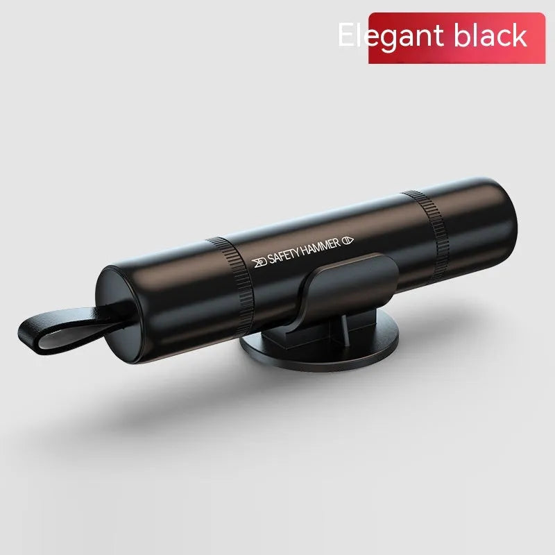 Aluminium alloy car safety hammer with a hardened steel tip for breaking windows and cutting seatbelts.