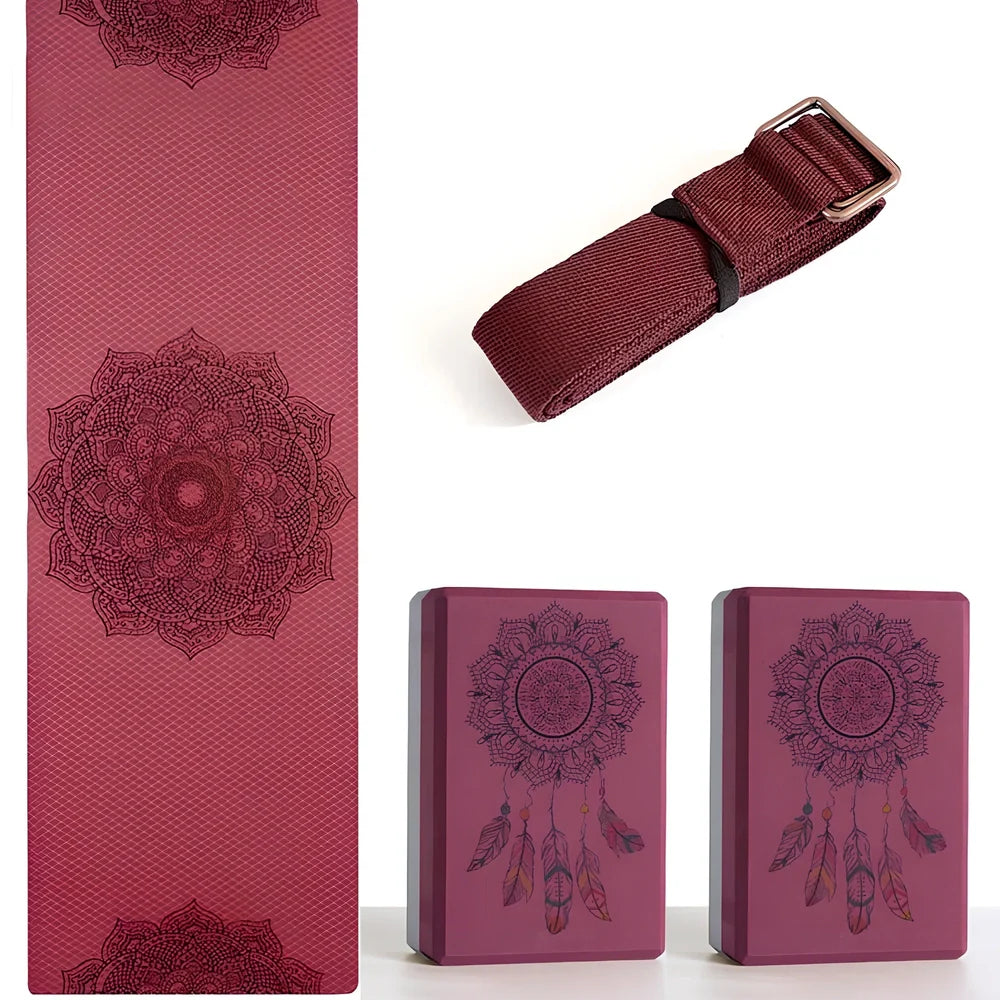 Black yoga brick with mandala pattern, 23cm long with textured surface for secure grip during yoga practice