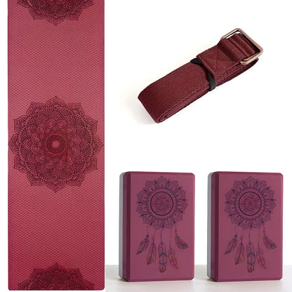 Black yoga brick with mandala pattern, 23cm long with textured surface for secure grip during yoga practice