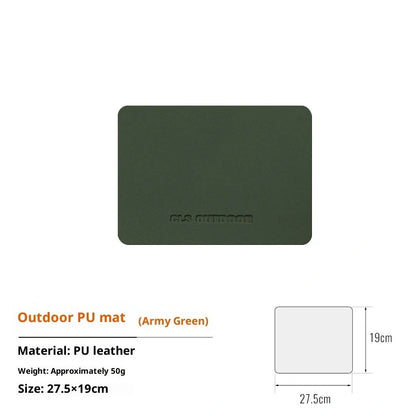 Waterproof heat insulation table mat in army green colour measuring 56×33cm on wooden dining table