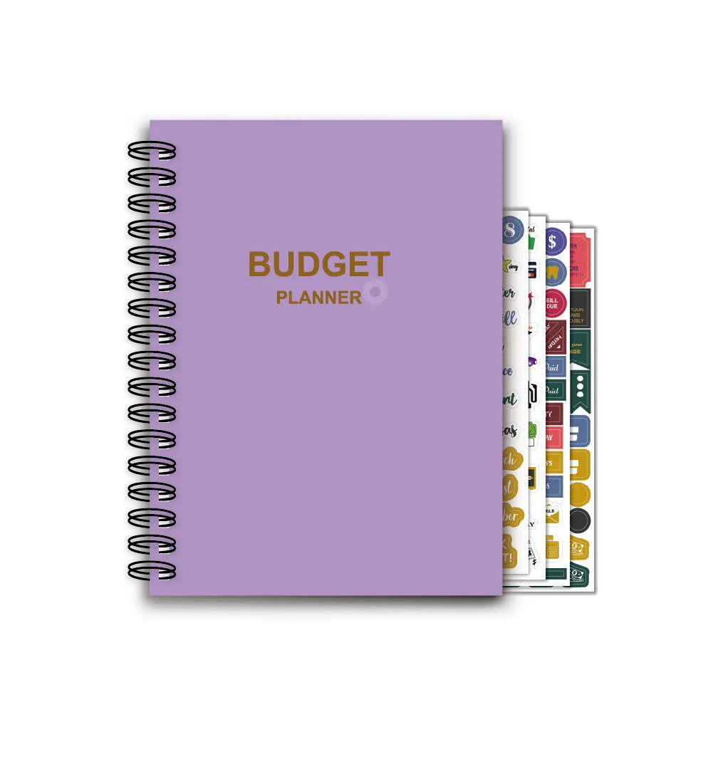 Purple coil-bound A5 budget notebook with pen, stickers and paper clips for financial planning