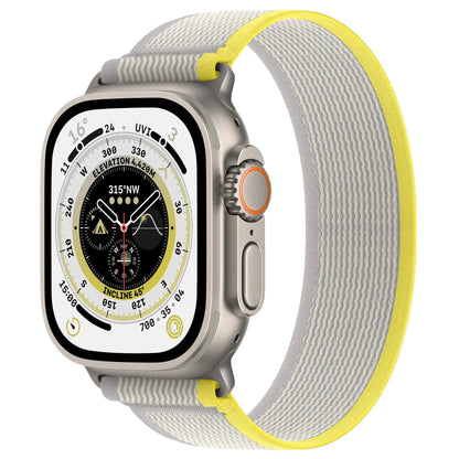 Nylon Apple Watch band with single ring strap closure in multiple colour options on a wrist