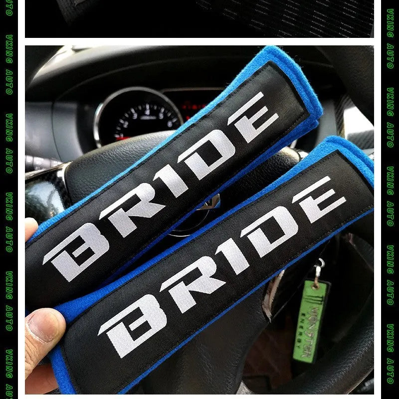 Car seat belt shoulder pad protectors, black blue red colour options, cotton and sponge cloth construction, embroidered woven mark craft, 22.5cm long 6.5cm wide 4.5cm thick set for interior car protection and seat belt comfort