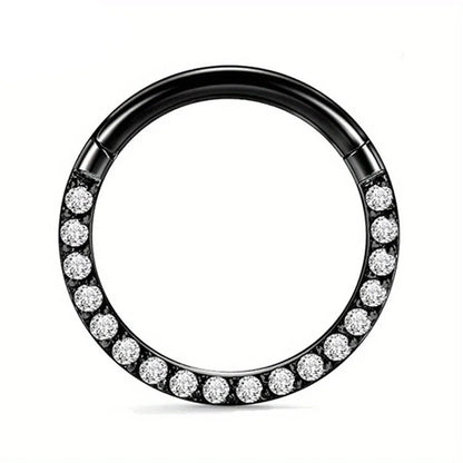 A seamless round hoop nose ring in stainless steel, shown alongside gold and rose gold colour options.