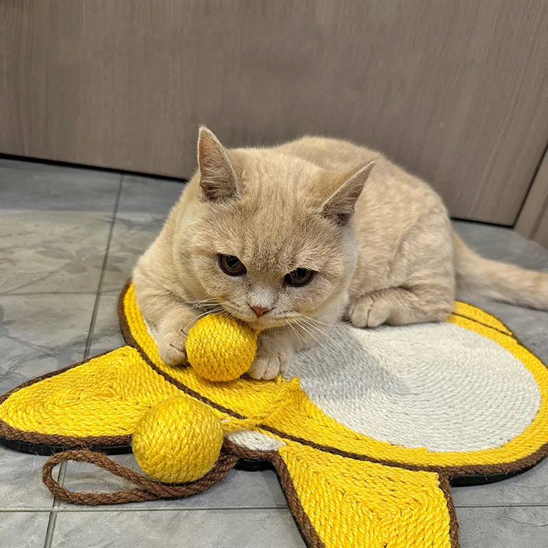 Yellow Corgi-butt design sisal cat scratching pad with anti-slip base, shown with adhesive hooks for wall mounting.