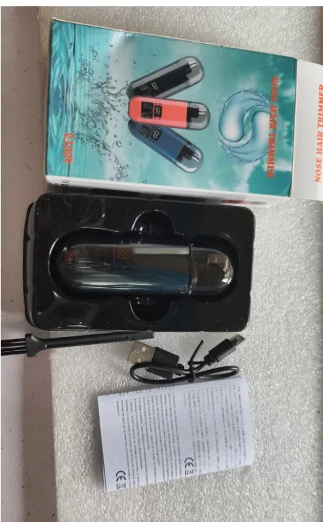 Rechargeable nose hair trimmer with digital display, cleaning brush, and USB charger