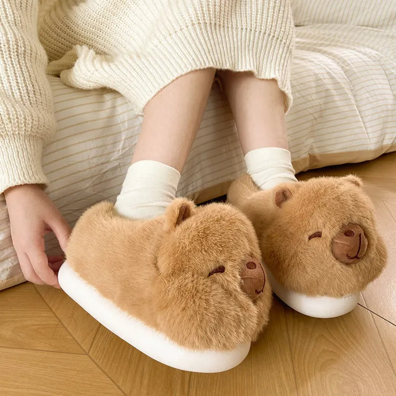 Light brown women's fleece slippers with round toe design and PVC sole
